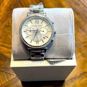 NWT womens Micheal Kors silver watch.